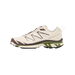 Right side view of a cream Salomon XT-6 sneaker with dark brown overlays, green and white midsole, and black outsole, shown facing left.