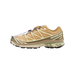 Right-side view of a tan Salomon XT-6 Gore-Tex trail sneaker with olive green overlays, toggle lace system, and a cream-pink-green layered midsole.