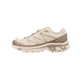 Right-side view of a cream Salomon XT-6 trail sneaker with tan overlays, brown accents, toggle lacing system, and chunky grey outsole.