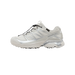 Side view of a beige and silver Salomon XT-Pathway GTX trail sneaker with quick-lace toggle and chunky lugged outsole, toe pointing left