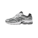 Side view of a gray, silver, and black Saucony OG ProGrid Omni 9 running shoe with white laces and a thick white and gray midsole.