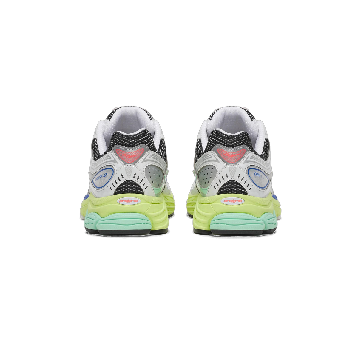 Rear view of a pair of Saucony Omni 9 sneakers side by side, showing white, black mesh, and grey panels, blue accents, a red logo tab, and lime and mint green midsole and outsole.