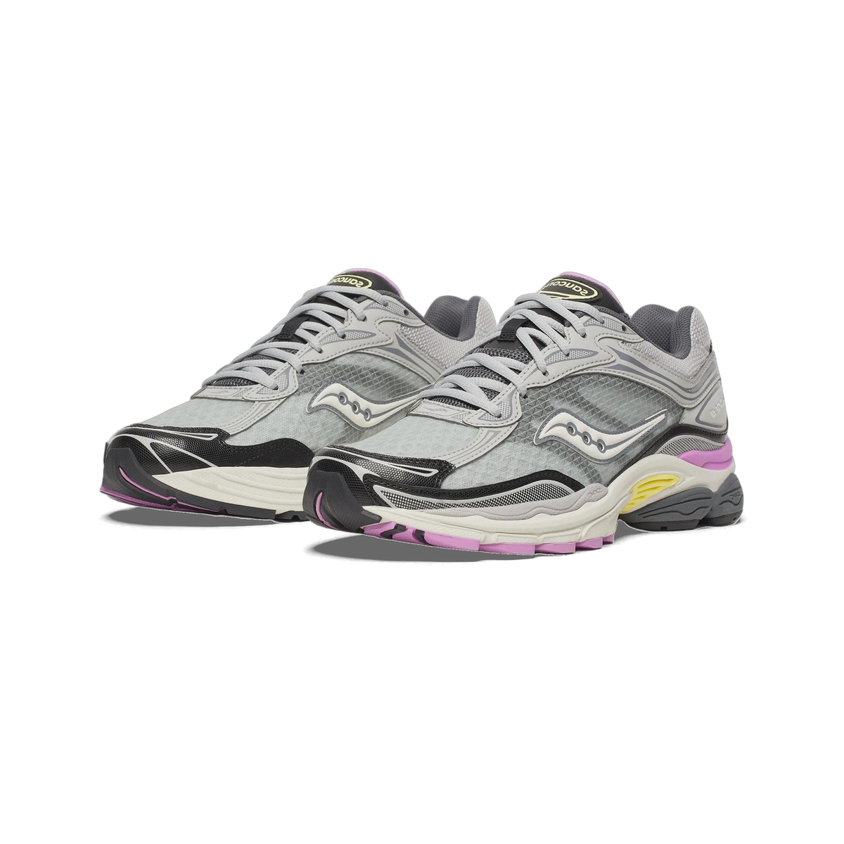 Pair of grey Saucony ProGrid Omni 9 running shoes with black overlays and purple and yellow accents on the midsole, viewed from the front at an angle.