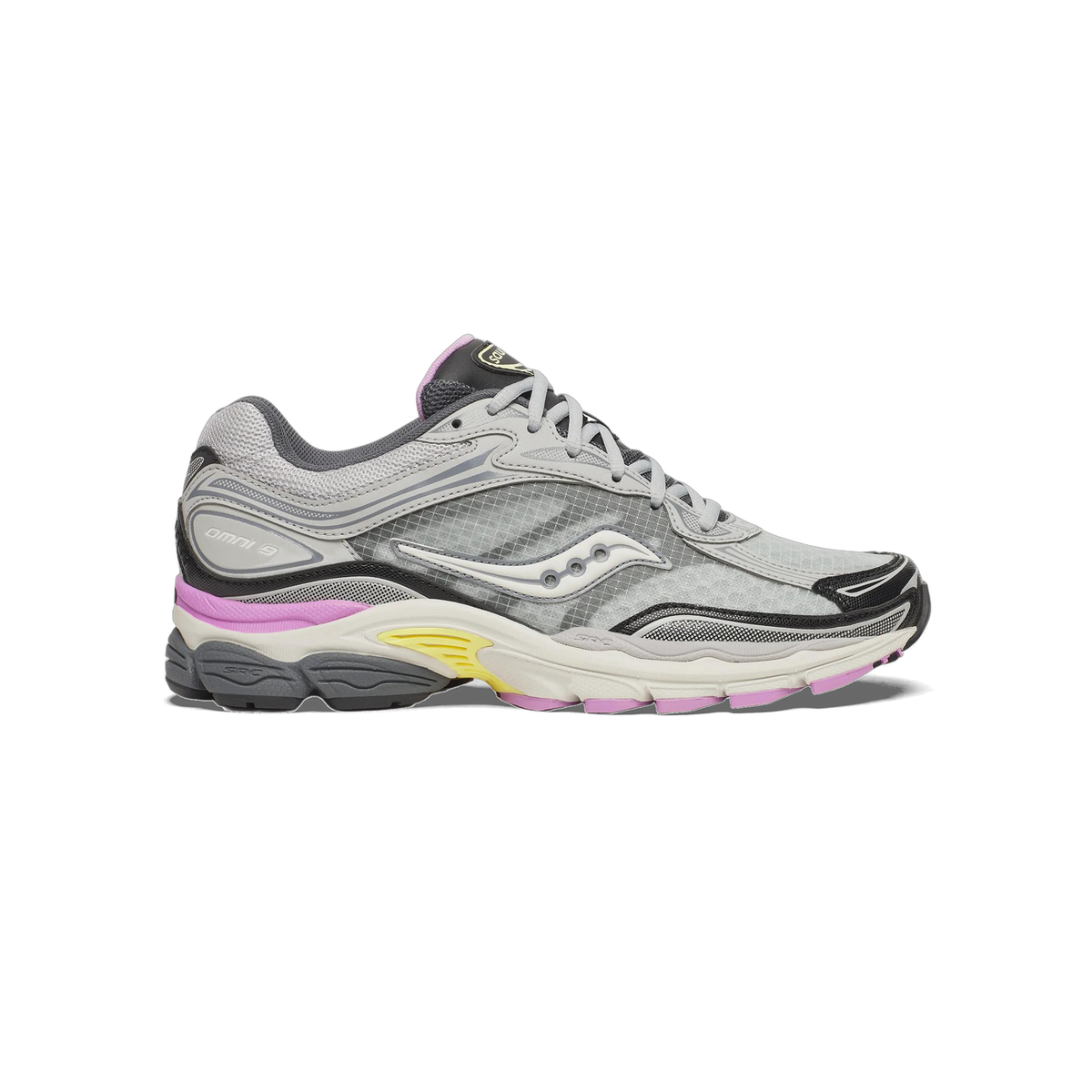 Side view of a grey Saucony ProGrid Omni 9 sneaker with black overlays, pink and yellow midsole accents, and a cream outsole, toe pointing left