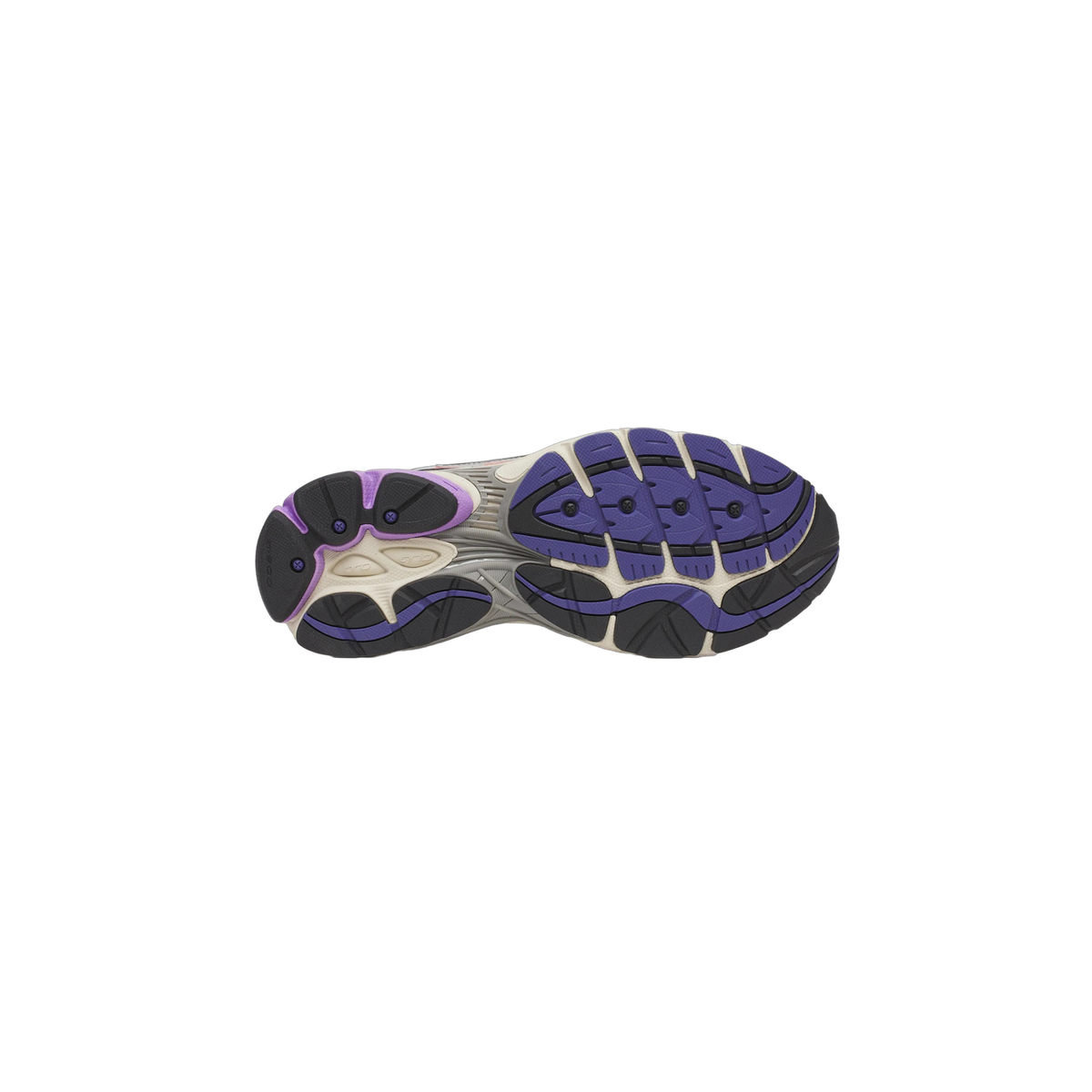 Underside of a Saucony ProGrid Omni 9 sneaker showing the full outsole, with purple and black tread, cream midsole sections, and grey shank, with the toe pointing to the left.