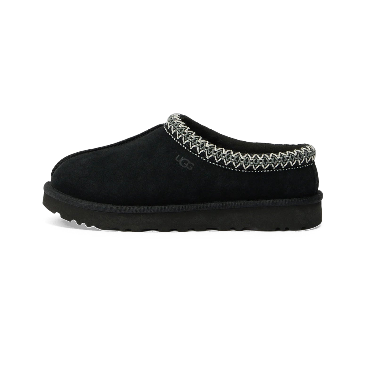 Side view of a black UGG Tasman II slip-on slipper with embroidered trim around the collar and a black rubber sole.
