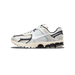 Right lateral view of a Nike Zoom Vomero 5 sneaker in light bone and black with a white swoosh and chunky multi-layer midsole.