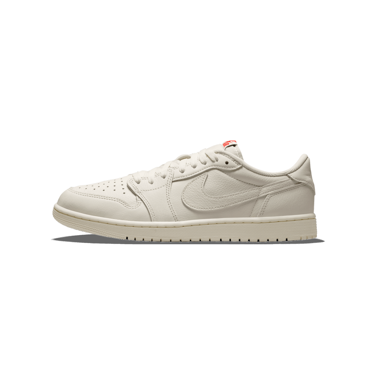 Side view of a sail-white low-top leather sneaker with tonal Swoosh logo, toe pointing left, and a small red graphic on the heel tab.