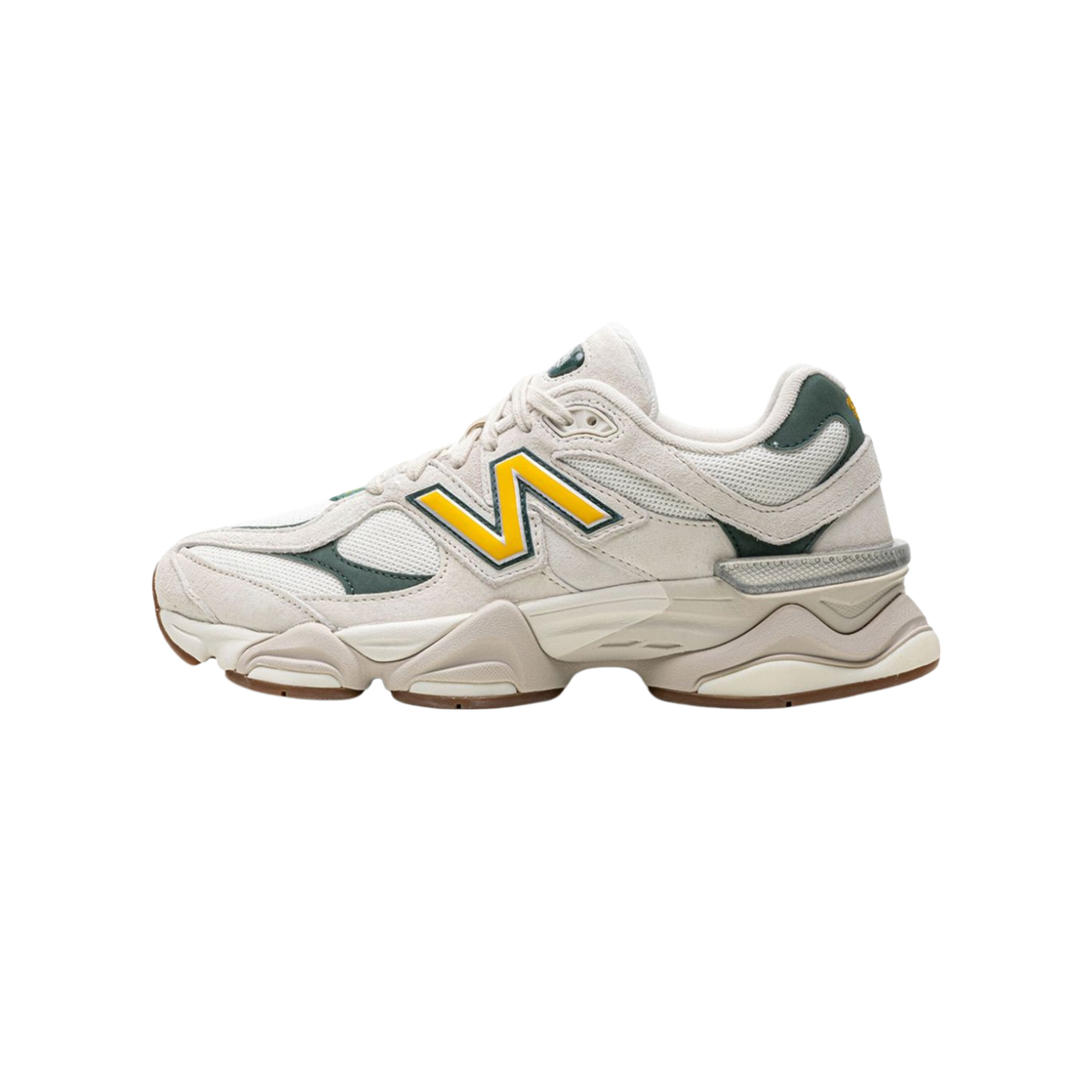 Side view of a cream New Balance 9060 sneaker with a yellow and dark green 'N' logo, green heel accent, and gum sole.