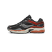 Side profile of a black Saucony Omni 9 running shoe with red-orange overlays, silver accents, a cream midsole, and an orange SRC outsole, with the toe pointing right.