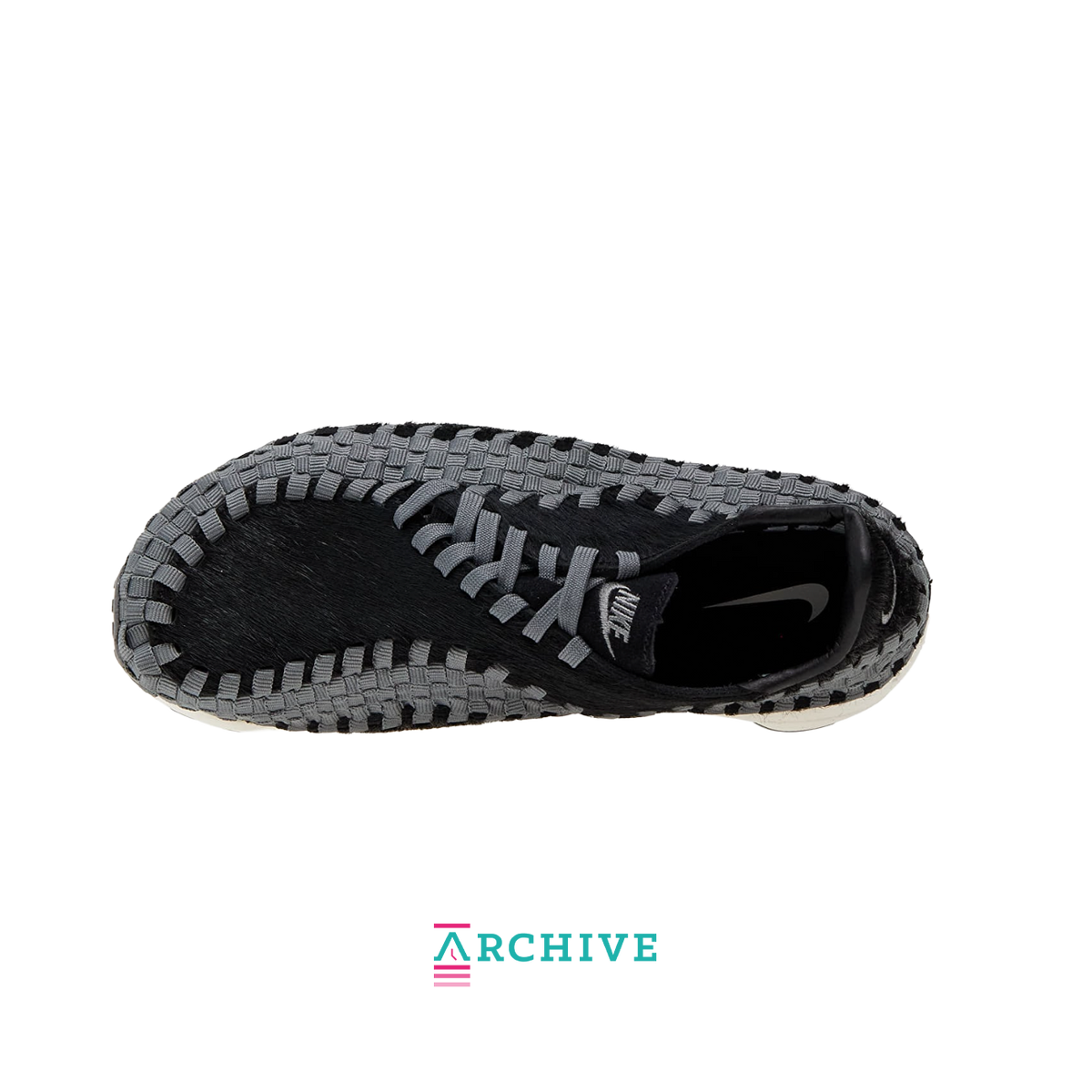 Nike Air Footscape Woven Black sneaker with woven side panels and asymmetrical lacing system