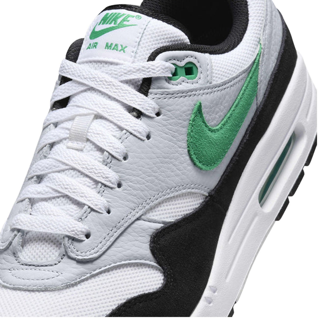 Nike Air Max 1 White Black Stadium Green sneaker with white mesh upper black detailing and green accents