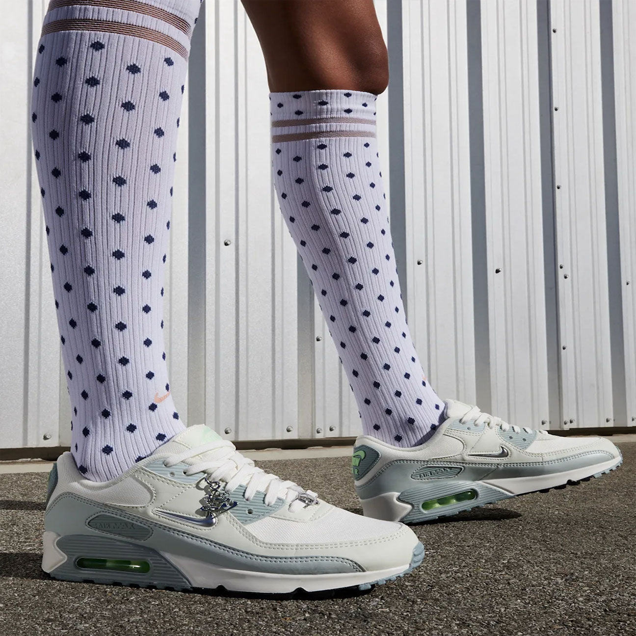 Nike Air Max 90 SE Molten Metal womens sneaker with leather upper metallic details and visible Air cushioning
