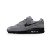 Nike Air Max 90 Smoke Grey Light Photo Blue sneaker with mesh and leather upper blue accents and classic Air Max cushioning available at The Attic