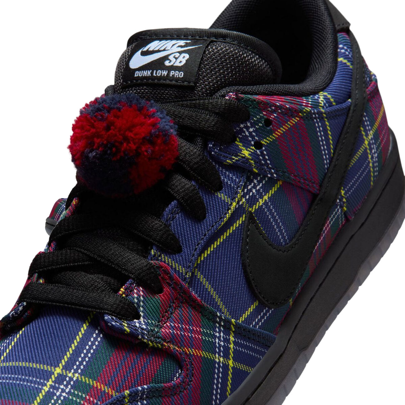 Nike SB Dunk Low Nardwuar sneaker with suede and leather upper tartan details and Zoom Air cushioning