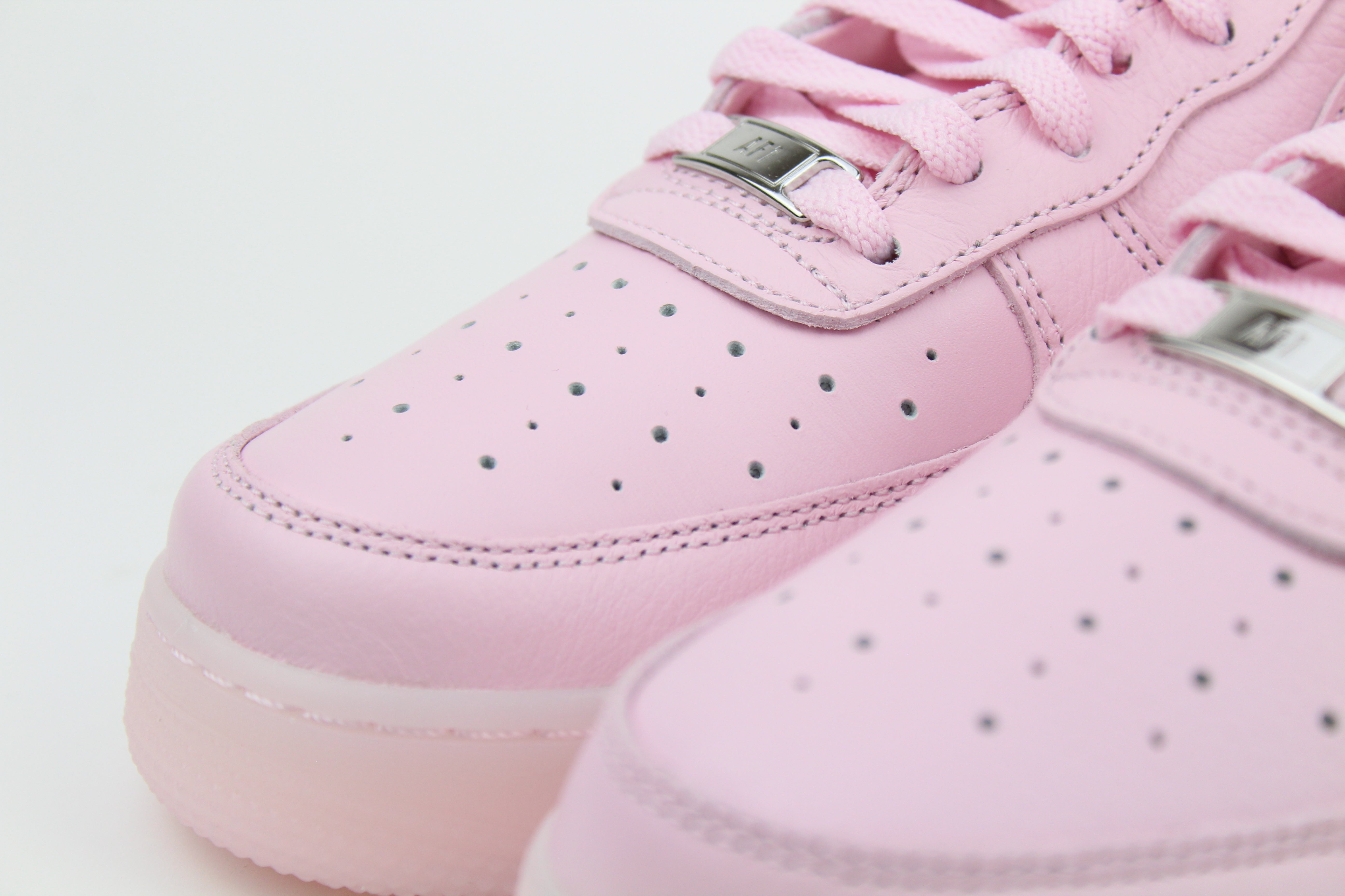 NOCTA x Nike Air Force 1 Low 'Pink Foam' from Certified Lover Boy Pack in soft pink leather. Classic cushioning meets fresh, streetwear style.