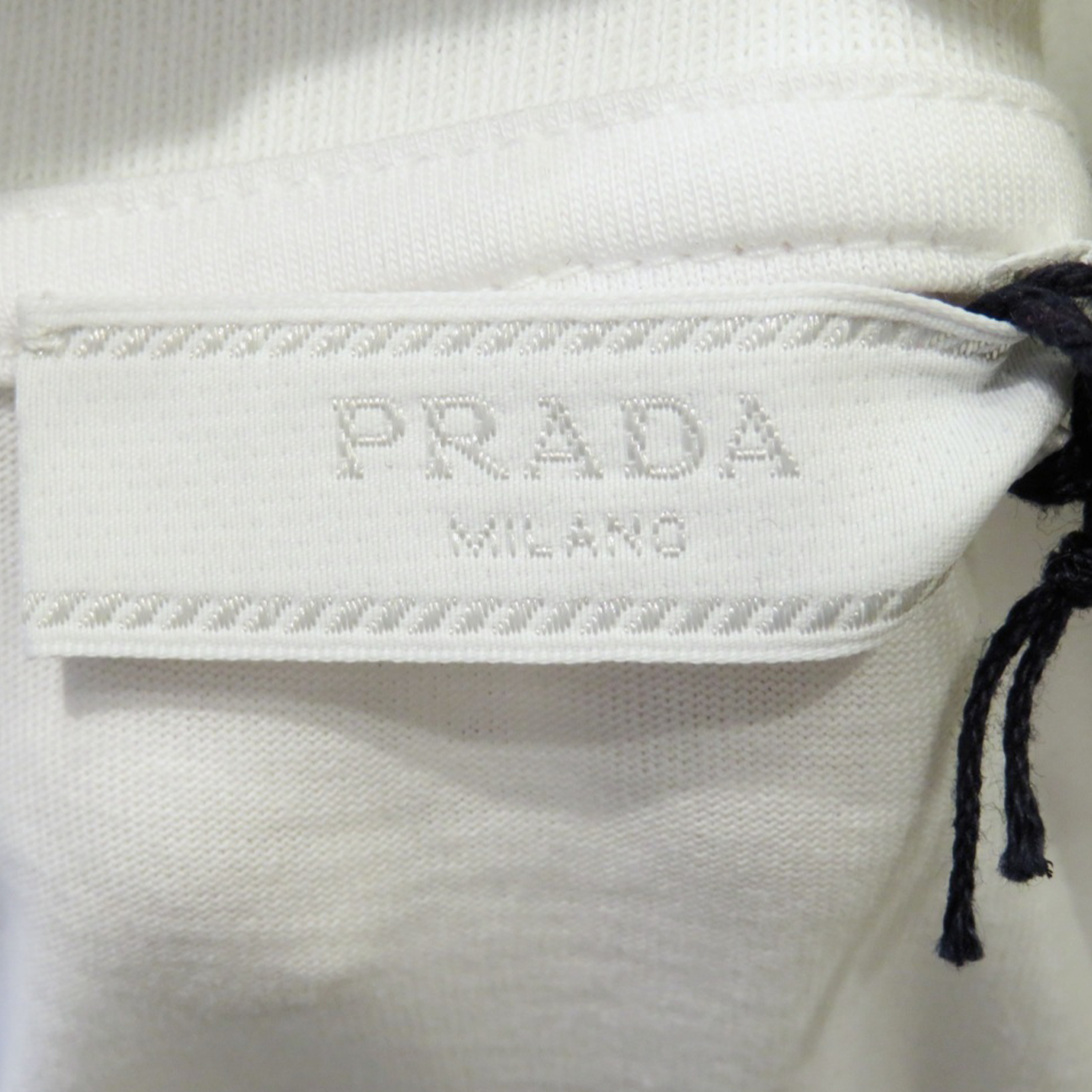 Prada T Shirt Pullover White Chest archive piece crafted from premium cotton with minimalist chest detail available at The Attic