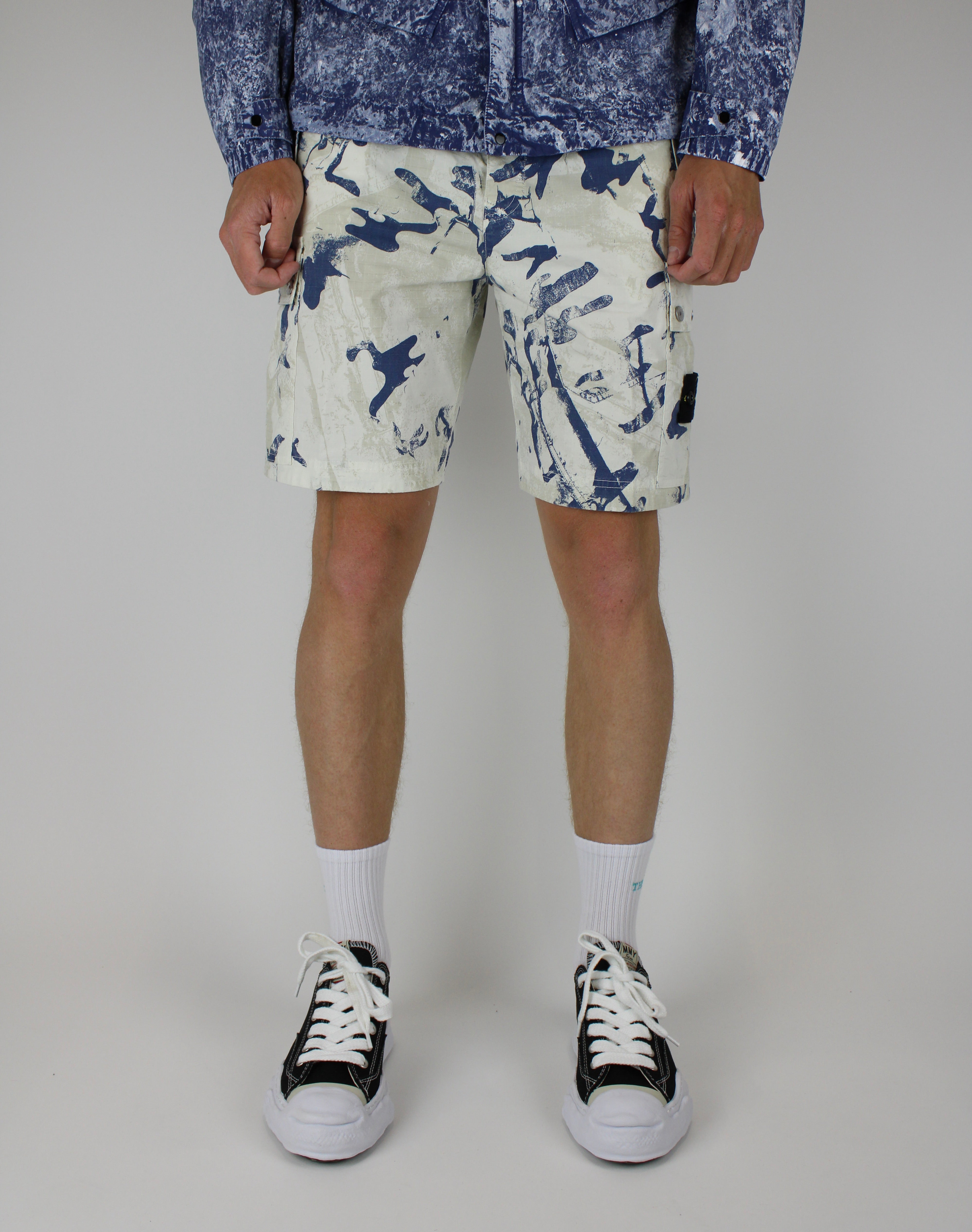 Stone Island Short 'Camouflage Desert' – stylish lightweight shorts with UV-reactive desert camouflage pattern, durable fabric, and iconic logo, ideal for outdoor and streetwear looks.