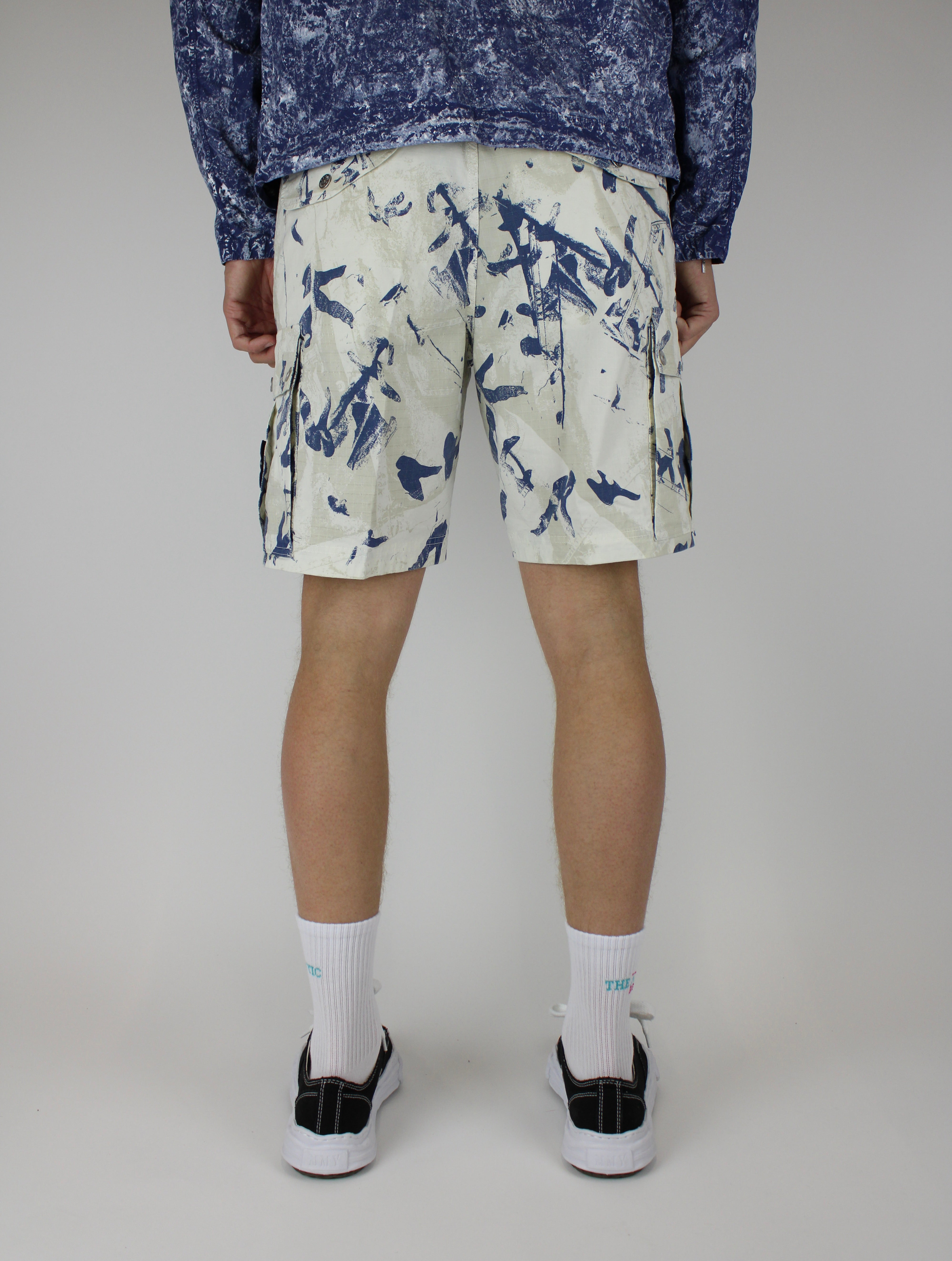 Stone Island Short 'Camouflage Desert' – stylish lightweight shorts with UV-reactive desert camouflage pattern, durable fabric, and iconic logo, ideal for outdoor and streetwear looks.