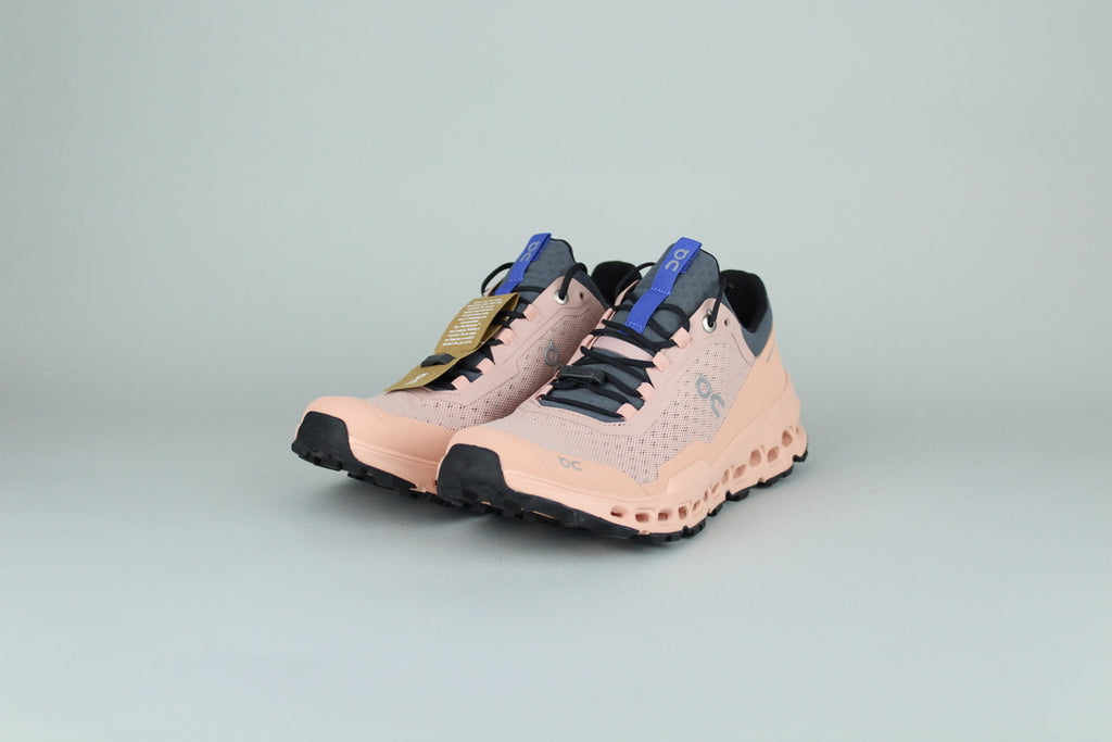 On Cloudultra 1 Rose women's running shoes side view, pink and white color scheme, cushioned and supportive, high-performance athletic footwear, stylish and comfortable