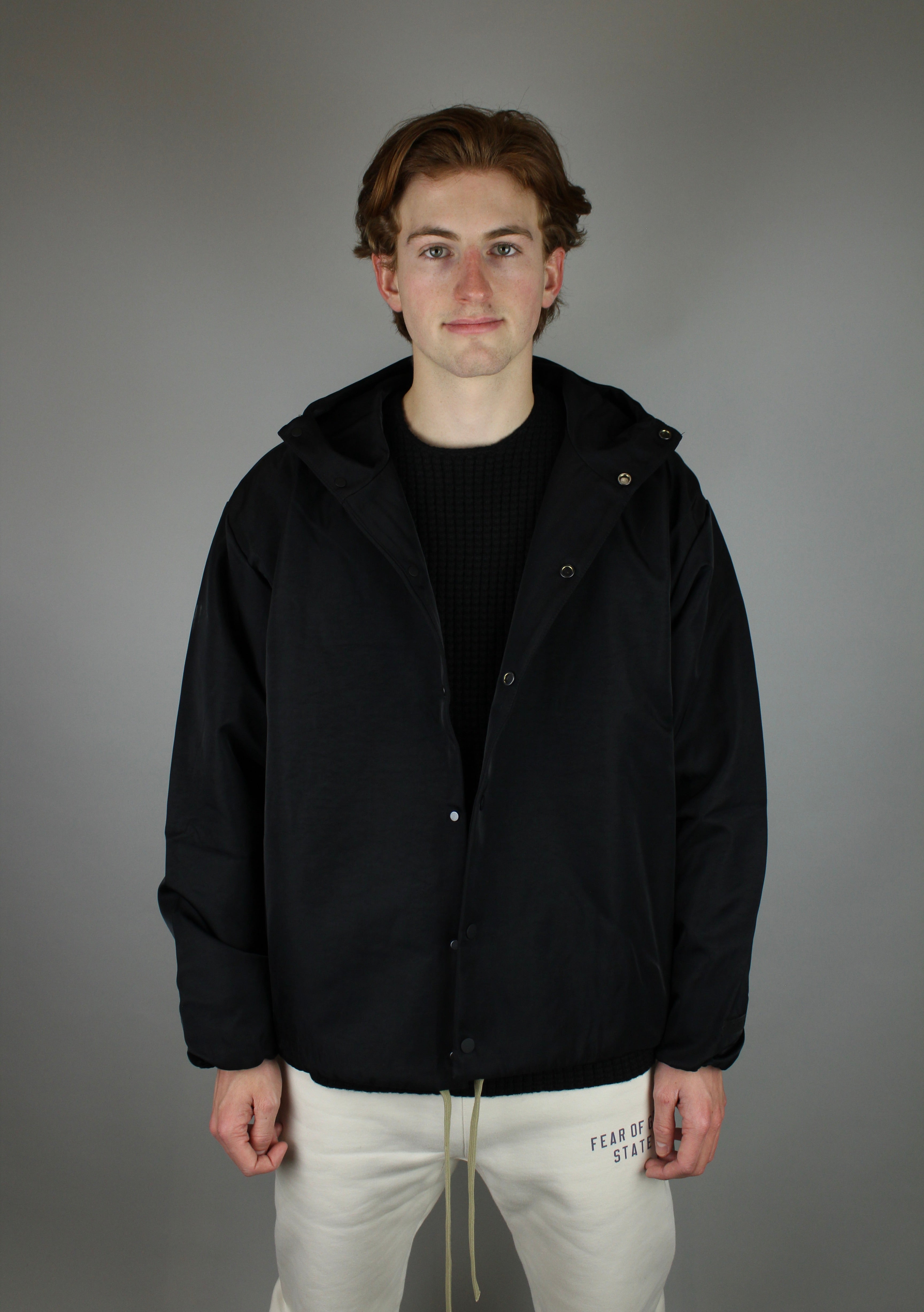 Fear of God Essentials Textured Nylon Hooded Coaches Jacket 'Black'-10040113070410-The Attic