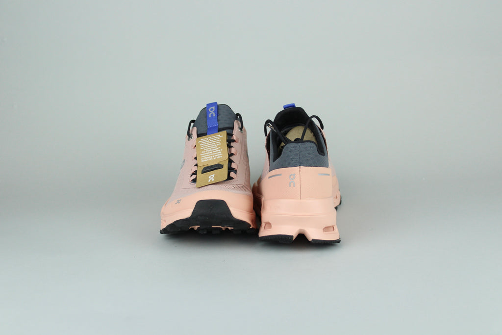 On Cloudultra 1 Rose women's running shoes side view, pink and white color scheme, cushioned and supportive, high-performance athletic footwear, stylish and comfortable