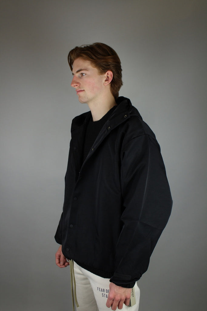 Fear of God Essentials Textured Nylon Hooded Coaches Jacket 'Black'-10040113070410-The Attic