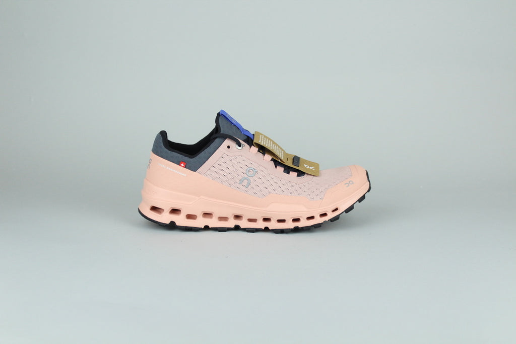 On Cloudultra 1 Rose women's running shoes side view, pink and white color scheme, cushioned and supportive, high-performance athletic footwear, stylish and comfortable