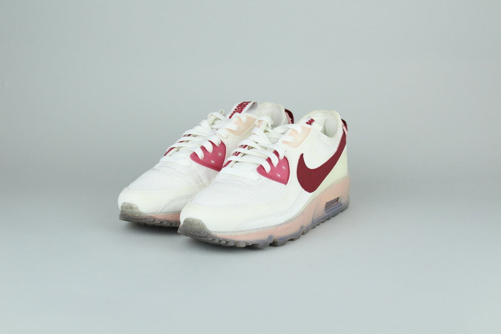 Nike Air Max 90 Terrascape Pomegranate sneakers side view, vibrant red and orange accents, eco-friendly design, vintage running shoe, innovative athletic footwear
