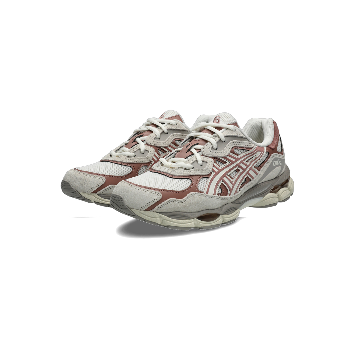 Pair of Asics GEL-NYC sneakers in cream, grey, and pink-brown tones angled toward the left with visible Asics logo on the side panel.