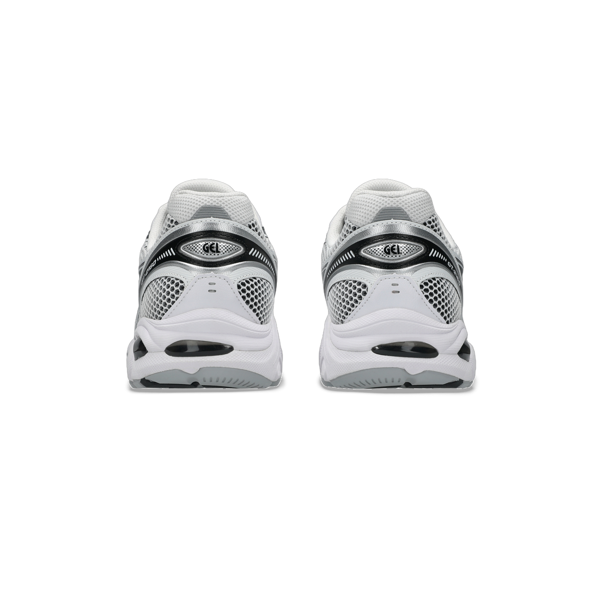 Rear view of a pair of white and gray Asics GT-2160 sneakers showing the silver and black heel gel cushioning unit.
