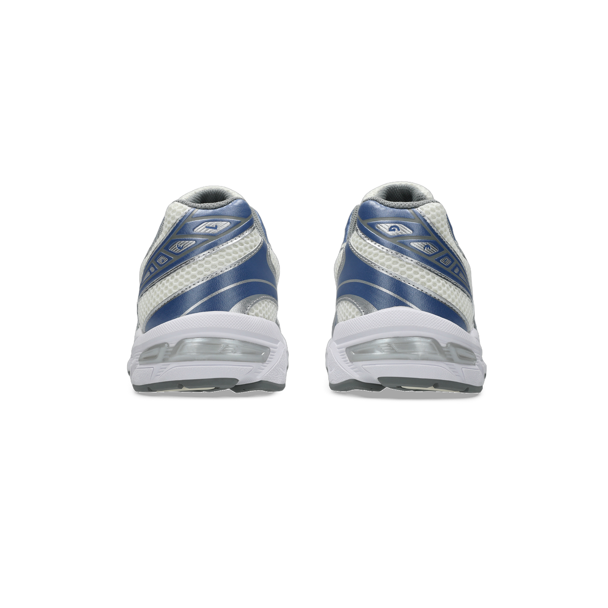Rear view of a pair of white and blue Asics Gel-1130 sneakers showing the heel counters and visible gel cushioning units in the soles