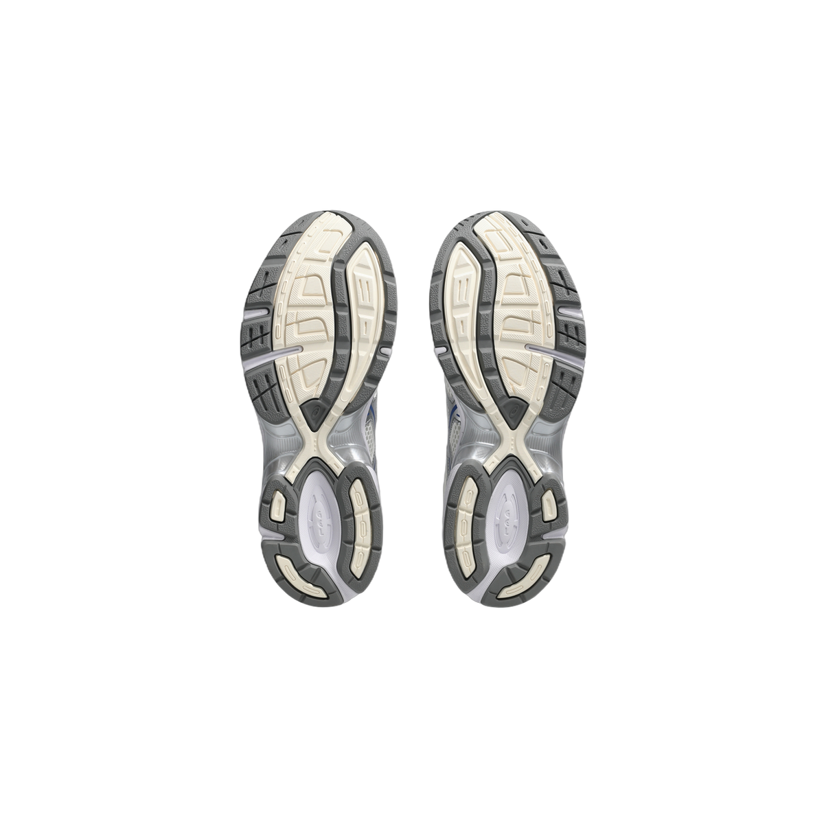 Bottom view of a pair of Asics Gel-1130 sneakers showing gray and cream tread pattern on the outsoles