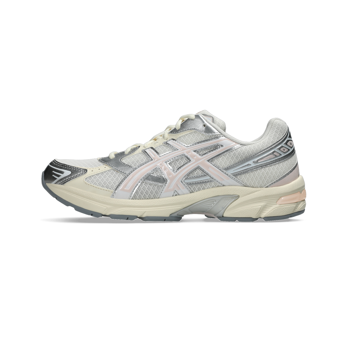 Side view of a cream and pink Asics Gel-1130 running shoe with silver mesh overlays and a cream midsole.