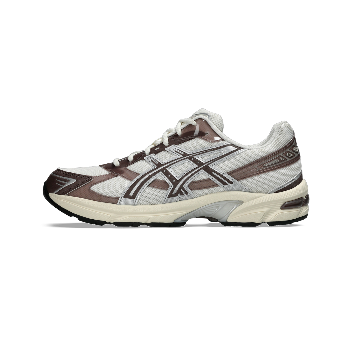 Side view of a white and brown Asics Gel-1130 sneaker with cream midsole and black outsole, toe pointing left
