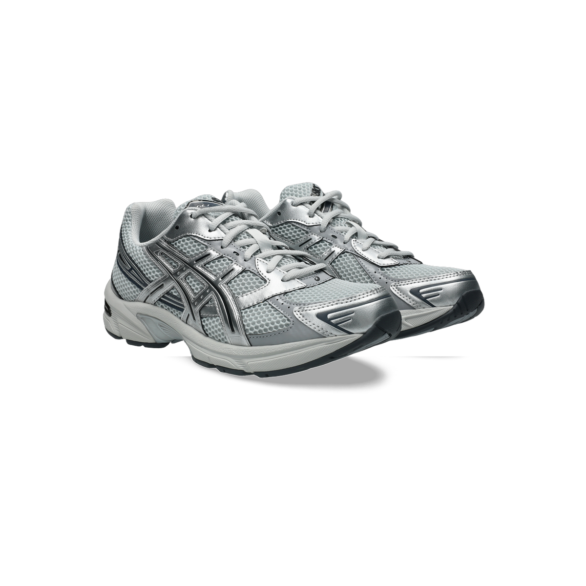 Pair of gray and silver Asics Gel-1130 sneakers with mesh uppers shown from a front side angle.