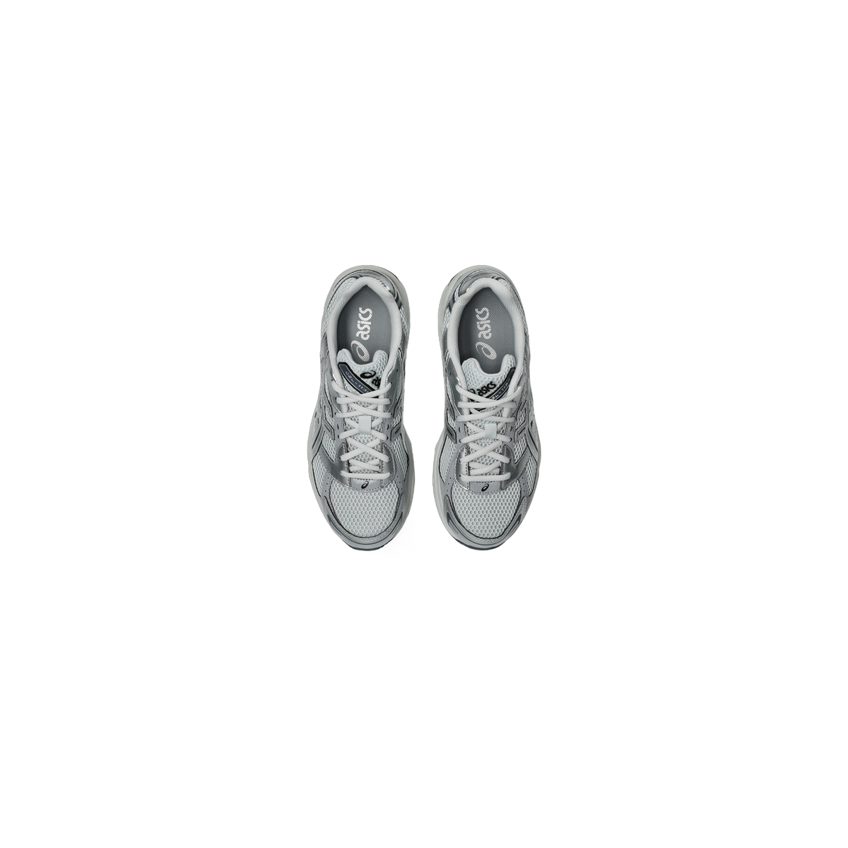 Top-down view of a pair of gray and silver Asics Gel-1130 sneakers with mesh uppers and Asics branding on the tongues