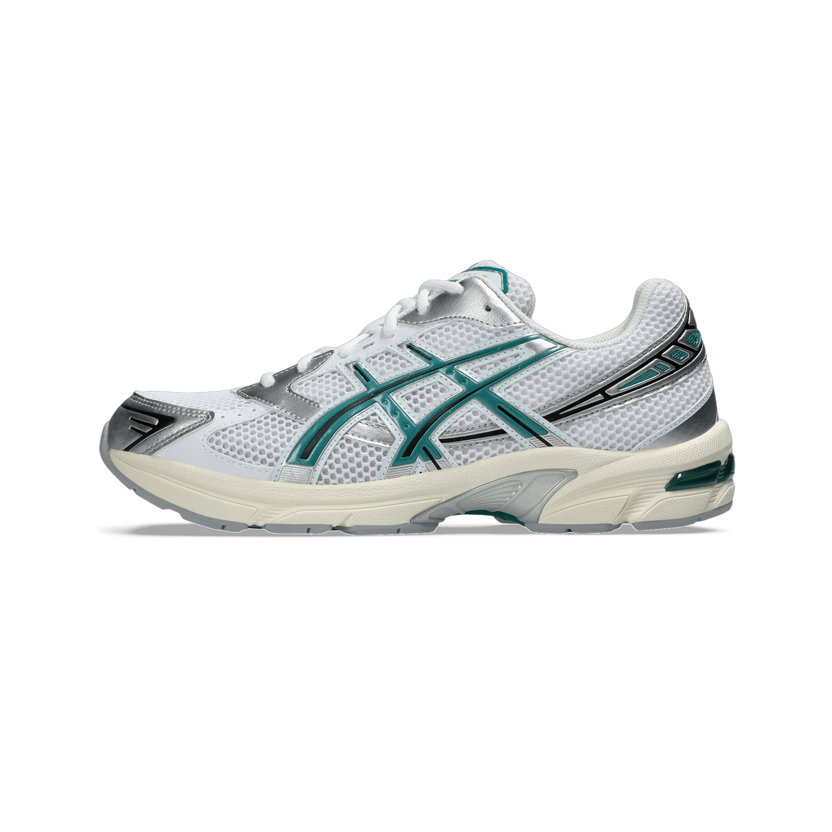 Side view of a white Asics Gel-1130 running shoe with teal cross-strap overlays, silver accents, and a cream midsole.