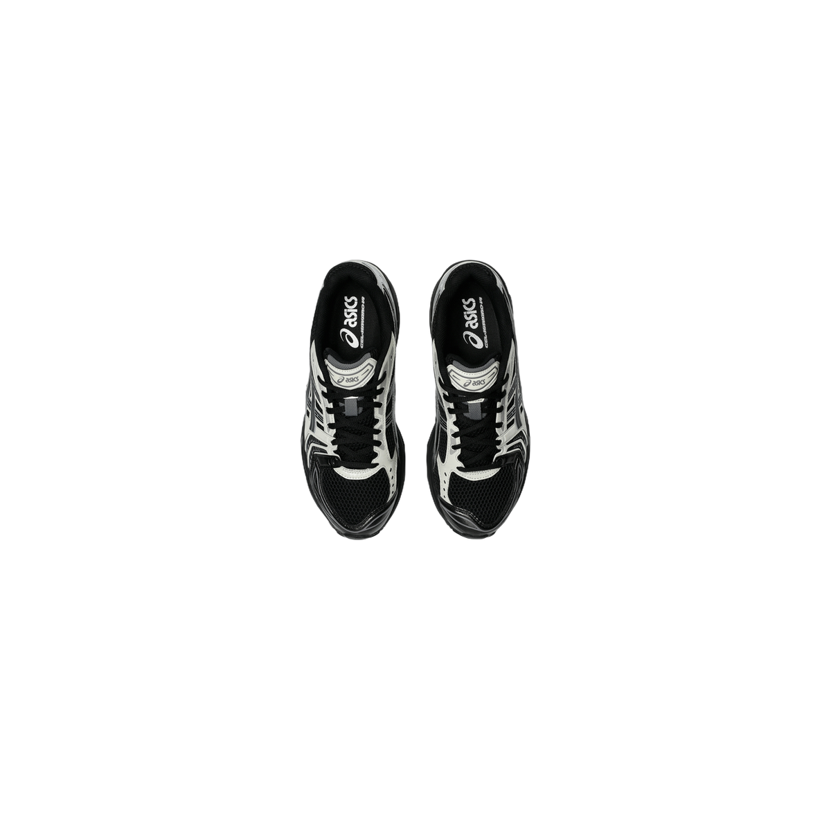 Top-down view of a pair of black and cream Asics Gel-Kayano 14 sneakers with black laces and Asics branding on the tongue and heel pull tab