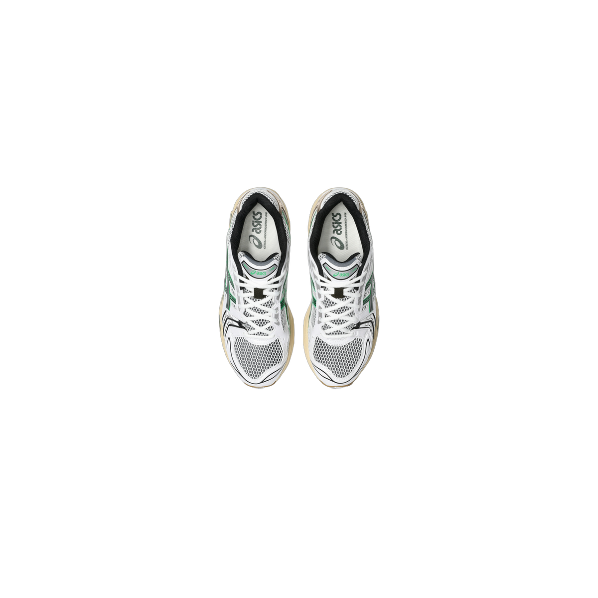 Top-down view of a pair of white Asics Gel-Kayano 14 sneakers with green accents, mesh toe panels, and beige midsoles.