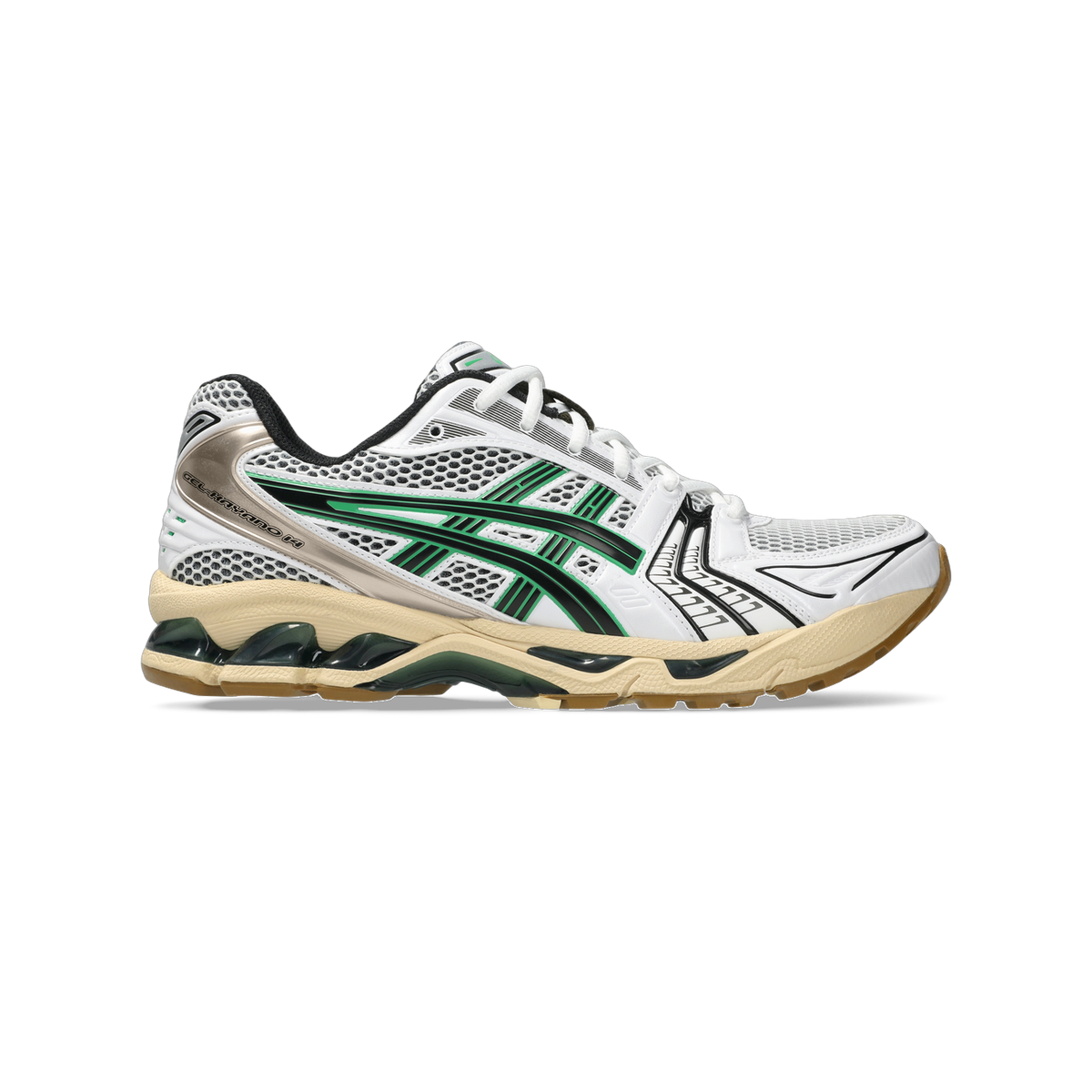 Side view of a white Asics Gel-Kayano 14 sneaker with green and black overlays, mesh upper, and a beige midsole with gum outsole