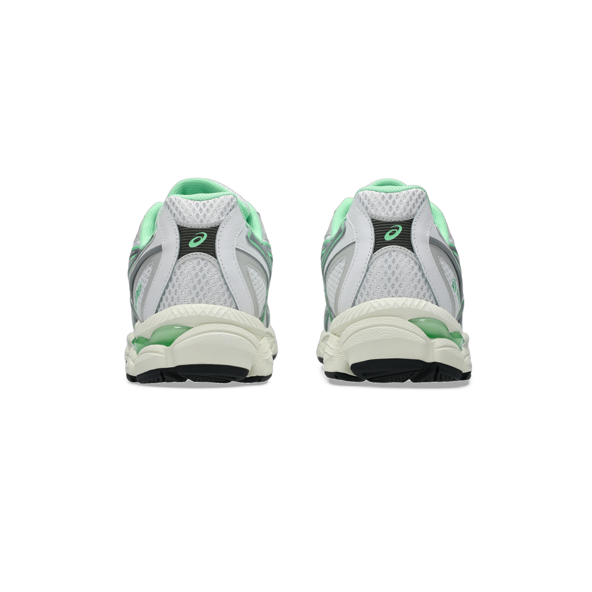 Rear view of a pair of white and green Asics Gel-NYC sneakers showing the heel cushioning, mesh panels, and Asics logo on both shoes.