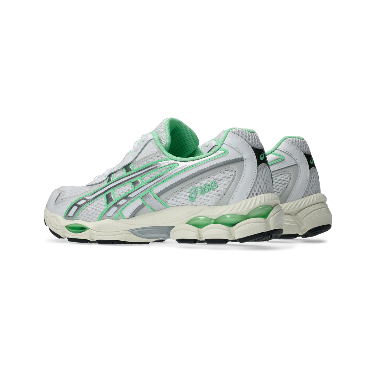 Side view of a white and green Asics Gel-NYC 2055 sneaker pair with visible gel cushioning in the sole and silver overlays