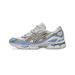 Lateral view of a white and periwinkle blue Asics Gel-NYC sneaker with brown geometric overlays and a chunky white midsole.
