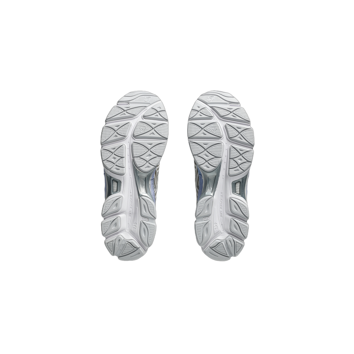 Bottom view of a pair of white Asics Gel-NYC sneakers showing the tread pattern with grey Gel and Guidance Line branding on the outsoles.