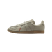 Side view of a grey leather adidas BW Army sneaker with toe pointing left, gum sole, and red zigzag stitching detail.