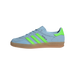 Left side view of a light blue adidas Gazelle sneaker with green stripes and heel tab, gum sole, and Gazelle text on the side