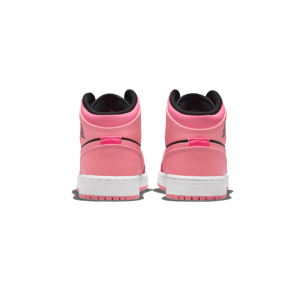 Rear view of a pair of pink Air Jordan 1 Mid sneakers with black heel tabs and white midsoles