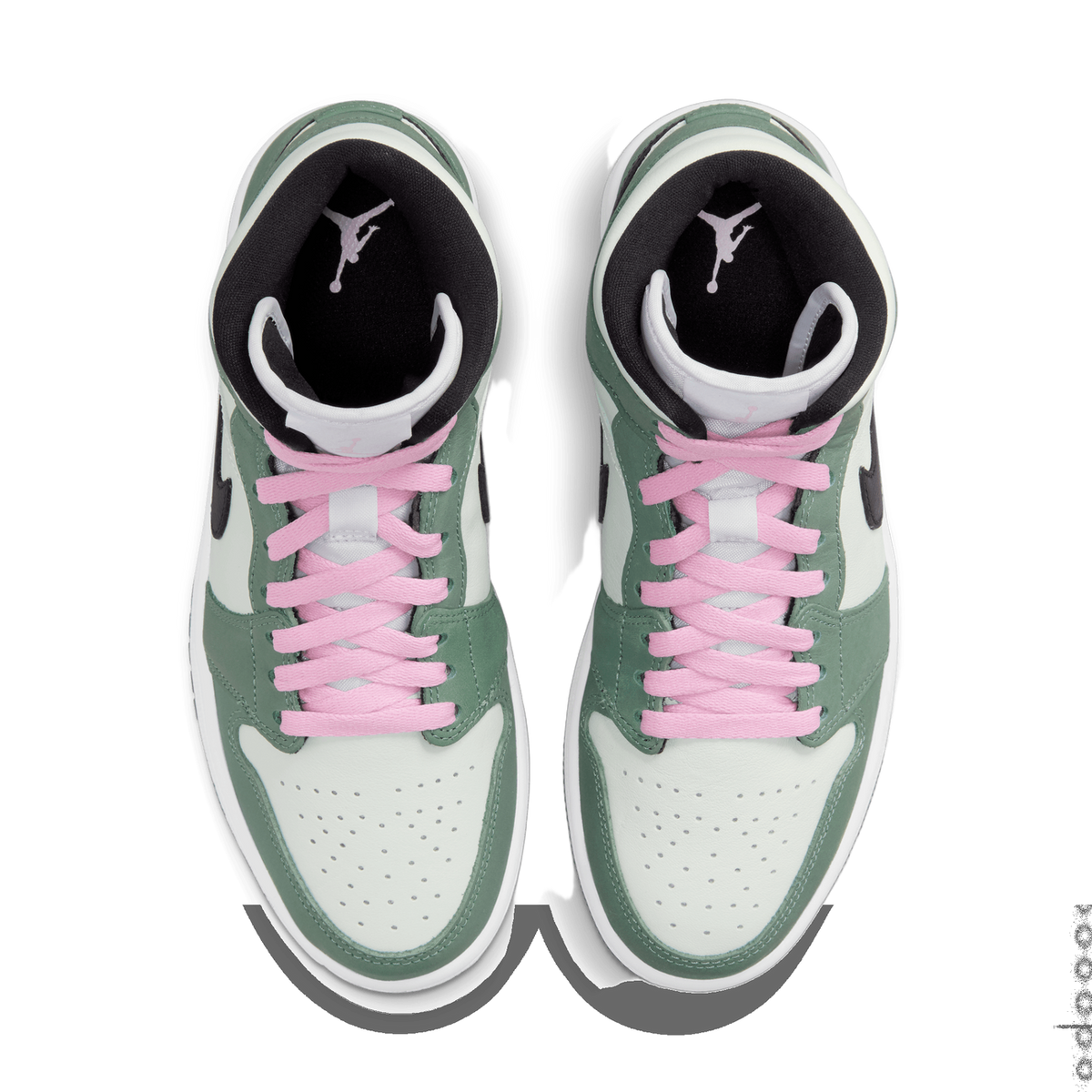 Top-down view of a pair of Air Jordan 1 Mid sneakers in green and white with pink laces and black Jordan Wings logo on the tongue