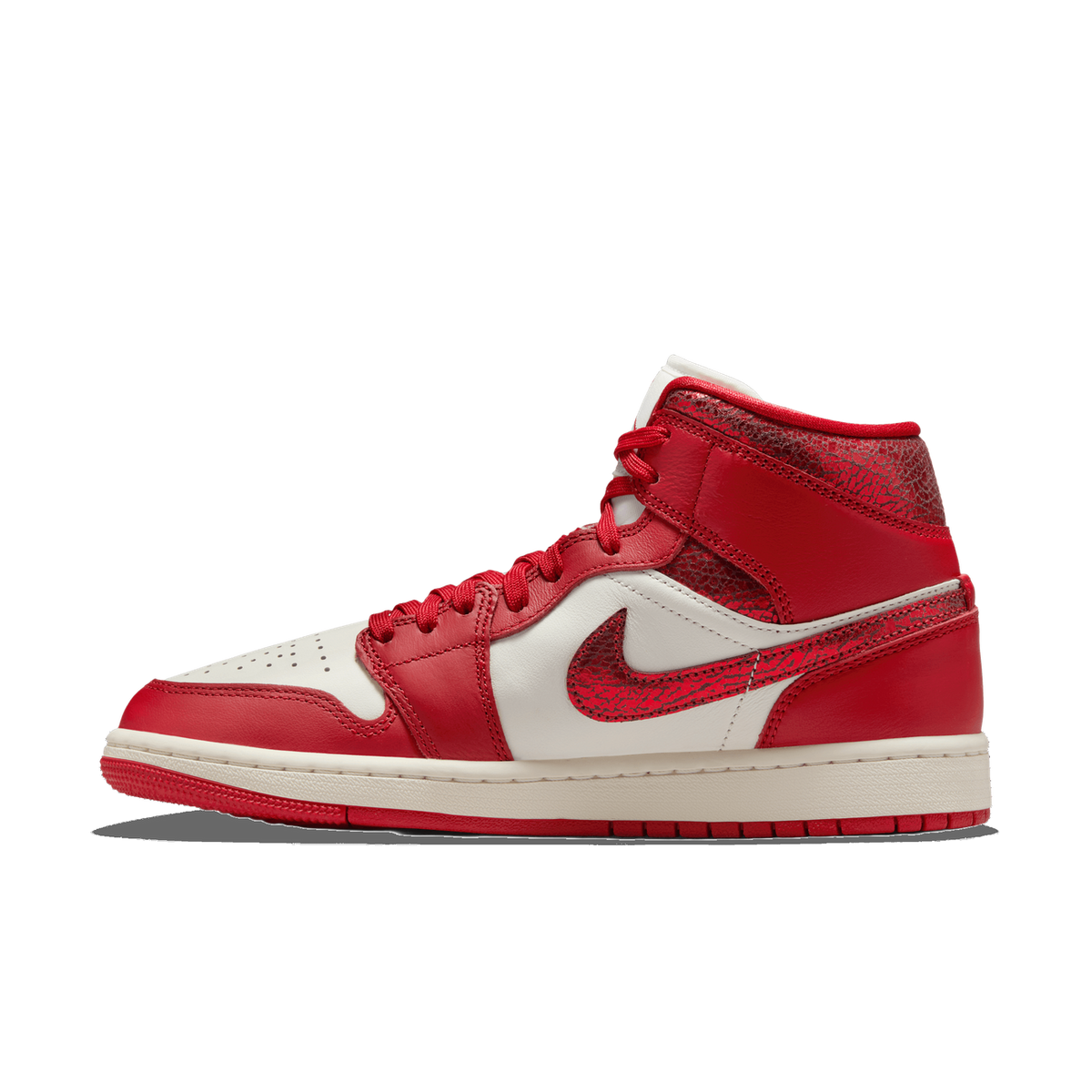 Lateral view of a red and white Air Jordan 1 Mid sneaker with cracked crimson leather panels on the heel and toe overlay.